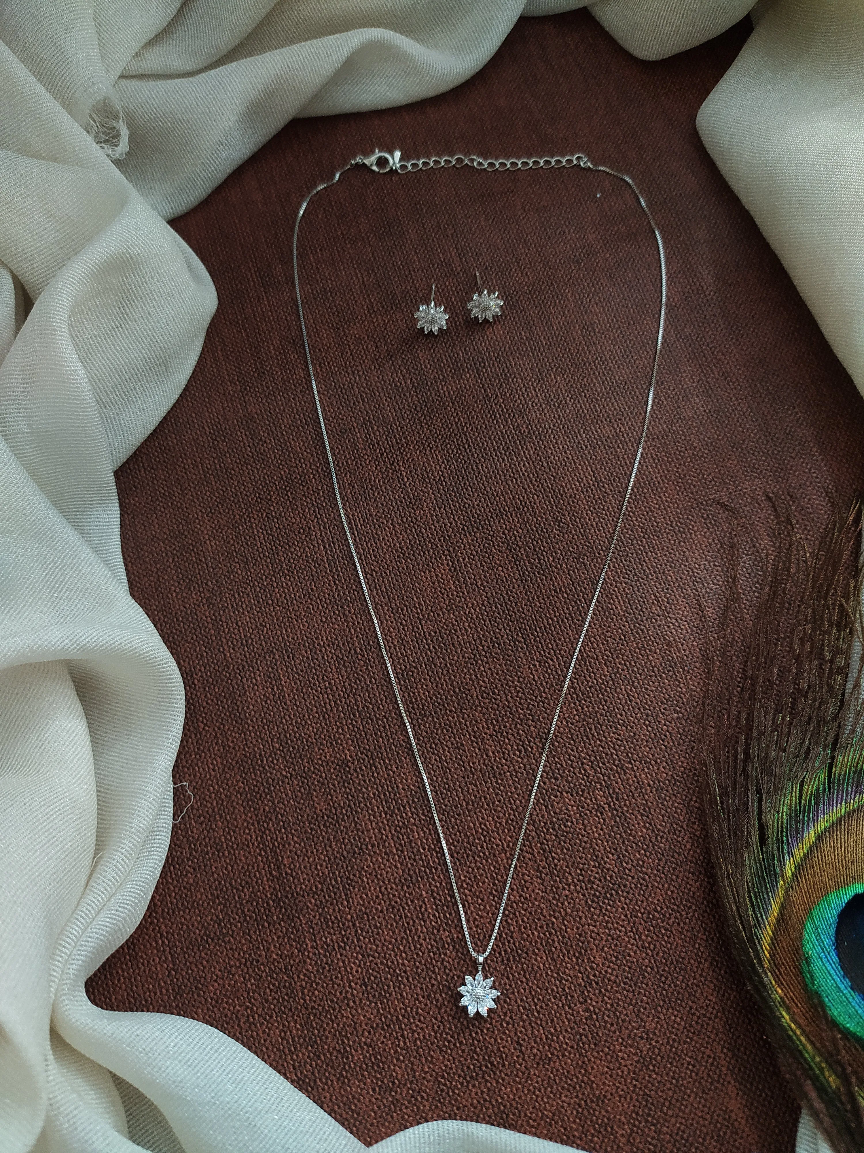 Enchanting Brilliance: The Sparkling Zircon Pendant Multi-Plated Chain Set