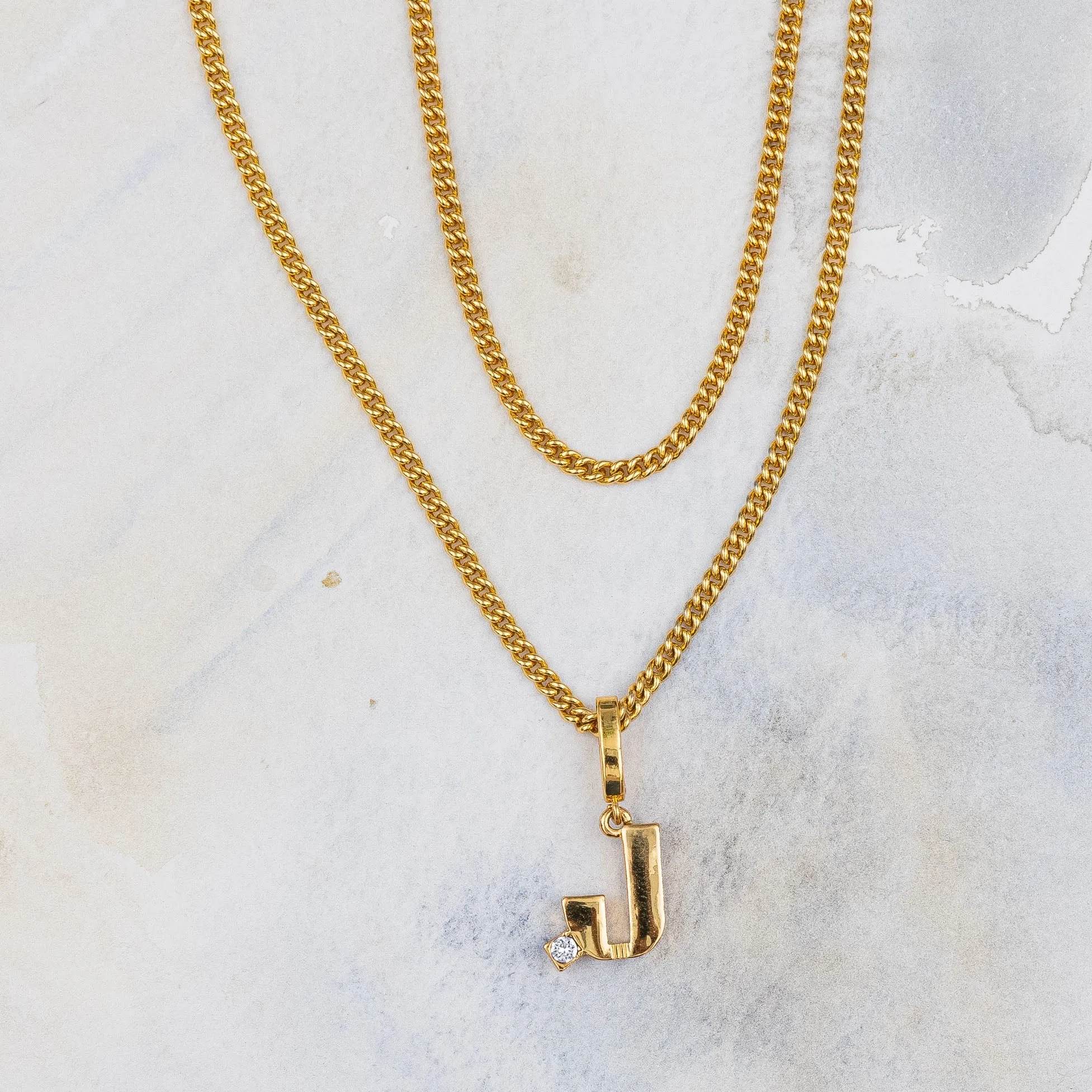 Monogram charm, J
